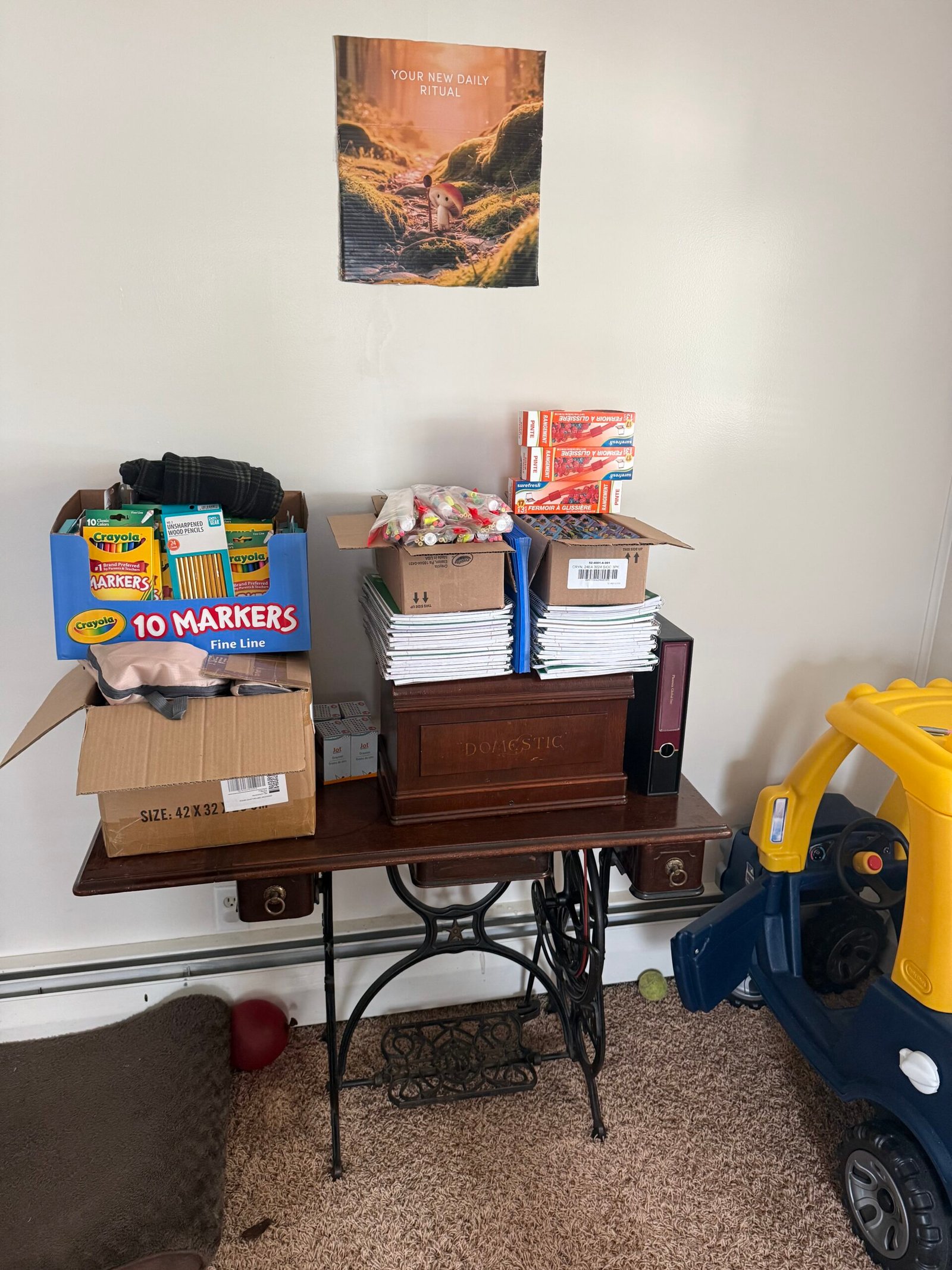 School supplies and notebooks assembled in boxes for community outreach