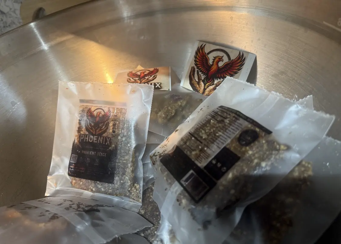 Early labeled Phoenix Bites gathered in a stainless steel bowl